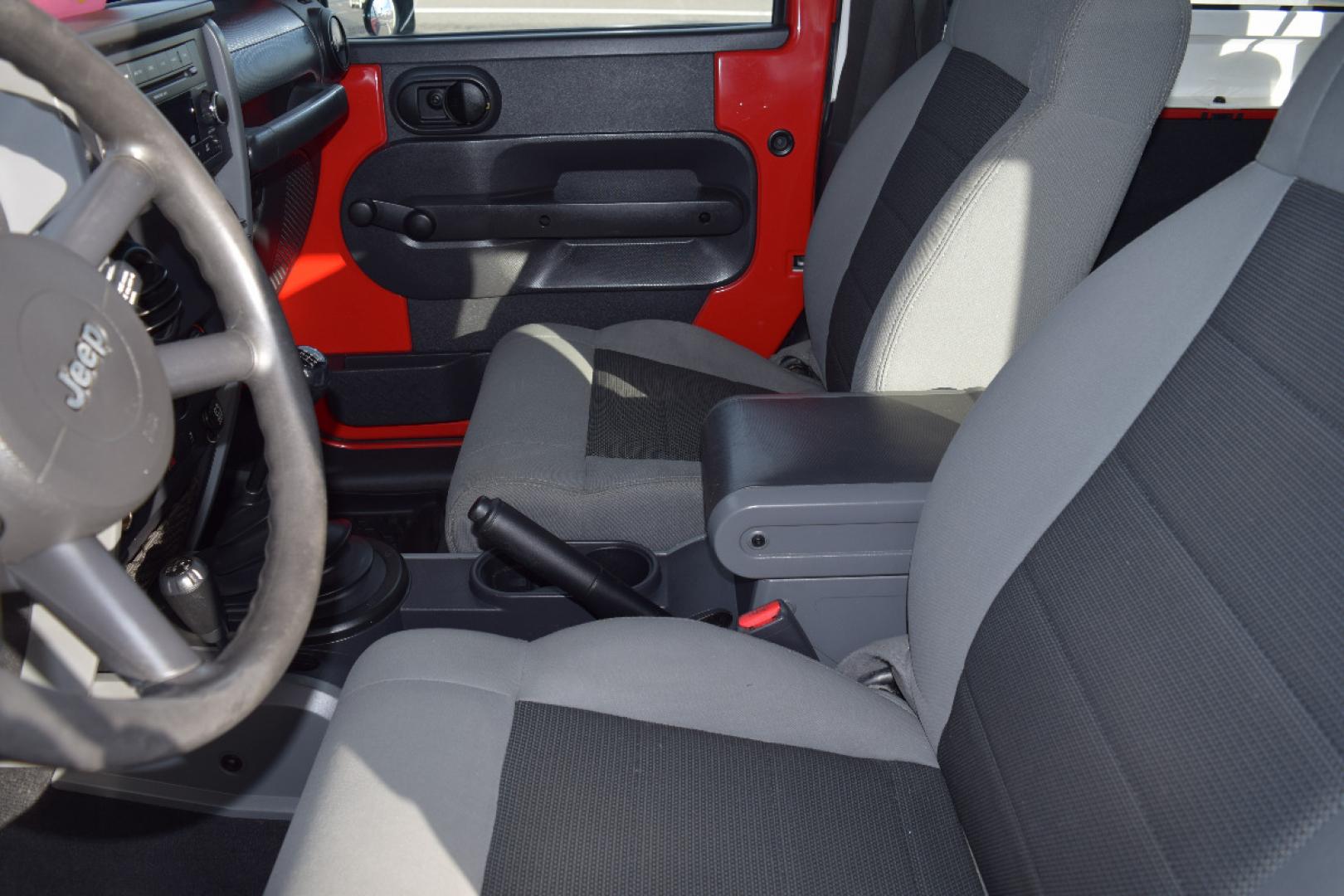 2010 RED /GRAY Jeep Wrangler Sport 4WD (1J4AA2D17AL) with an 3.8L V6 OHV 12V engine, 6-SPEED transmission, located at 607 W Columbia Drive, Kennewick, WA, 99336, (509) 987-1069, 46.216743, -119.126404 - FOR MORE INFORMATION PLEASE GIVE US A CALL TOLL FREE AT 509-582-8818 OR FOR MORE OPTIONS PLEASE VIEW OUR INVENTORY ON THE WEB AT USAAUTOSALES.NET Si te gusta este vehiculo y usted tiene preguntas, por favor llame gratis al numero (509) 582-8818 y alguien le ayudara. VEHICLE PRICE DOES NOT INCLUDE TA - Photo#18