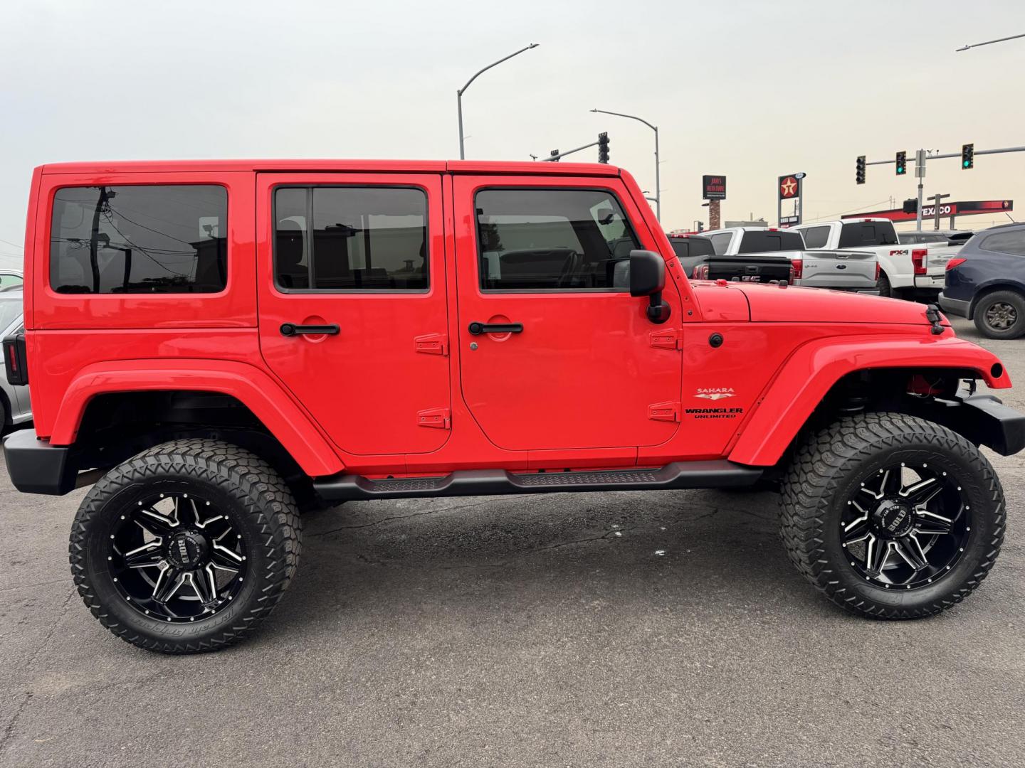 2013 Red /No Color Jeep Wrangler (1C4BJWEGXDL) with an V6, 3.6 Liter engine, Automatic, 5-Spd transmission, located at 607 W Columbia Drive, Kennewick, WA, 99336, (509) 987-1069, 46.216743, -119.126404 - Photo#3