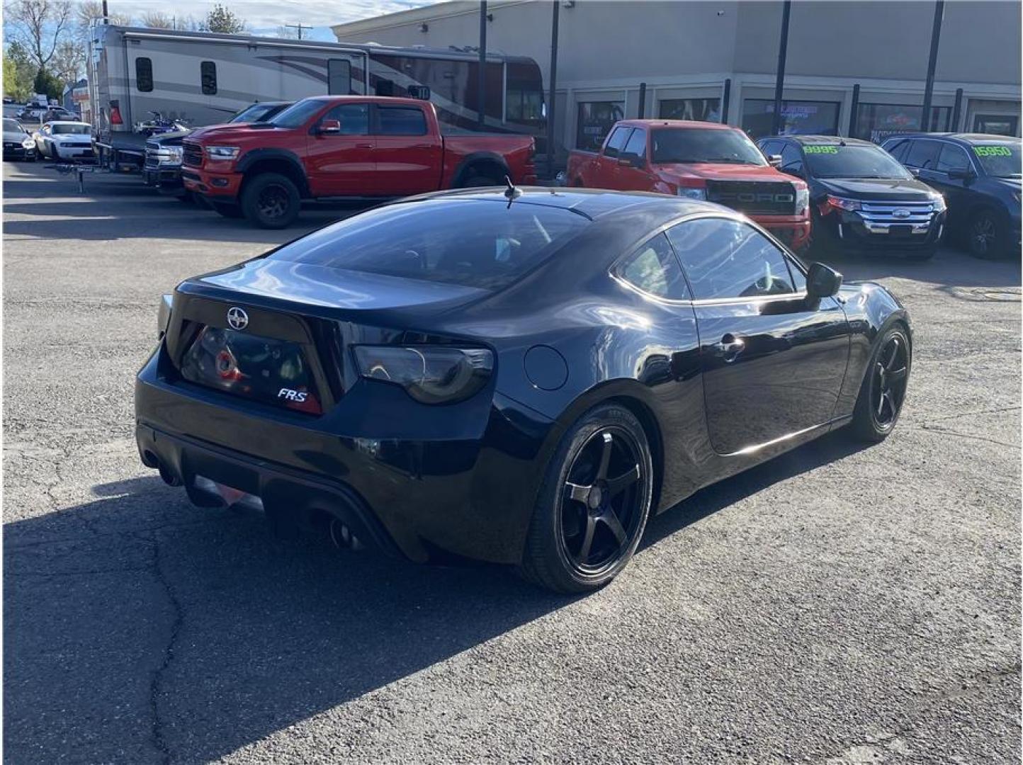 2013 Black /No Color Scion FR-S Base (JF1ZNAA17D2) with an 4-Cyl, 2.0 Liter engine, Automatic, 6-Spd transmission, located at 607 W Columbia Drive, Kennewick, WA, 99336, (509) 987-1069, 46.216743, -119.126404 - The 2013 Scion FR-S delivers an engaging driving experience with precision handling, rear-wheel drive performance, and a lightweight sport coupe design. Powered by a 2.0L BOXER engine producing 200 horsepower, the FR-S is engineered for balance and responsiveness, making it a favorite among driving - Photo#4