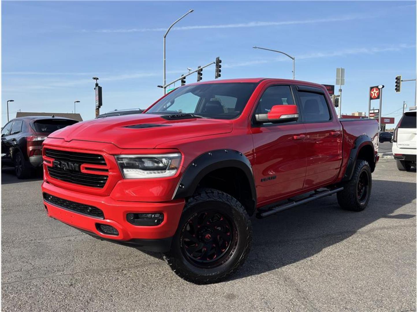 2019 Red /No Color Ram 1500 Crew Cab Rebel (1C6SRFLT1KN) with an V8, HEMI, eTorque, 5.7 Liter engine, Automatic, 8-Spd transmission, located at 607 W Columbia Drive, Kennewick, WA, 99336, (509) 987-1069, 46.216743, -119.126404 - The 2019 Ram 1500 Rebel Crew Cab delivers a powerful combination of off-road capability, bold styling, and full-size truck performance. Equipped with a proven 5.7L HEMI V8 engine producing strong horsepower and torque, this Rebel offers impressive towing capability of up to approximately 11,300 poun - Photo#0
