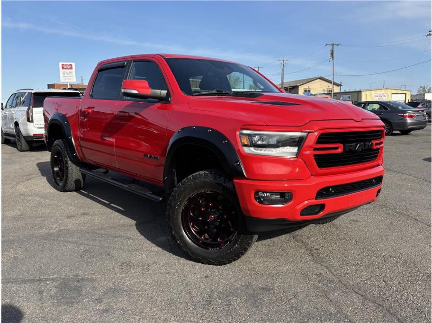 2019 Red /No Color Ram 1500 Crew Cab Rebel (1C6SRFLT1KN) with an V8, HEMI, eTorque, 5.7 Liter engine, Automatic, 8-Spd transmission, located at 607 W Columbia Drive, Kennewick, WA, 99336, (509) 987-1069, 46.216743, -119.126404 - The 2019 Ram 1500 Rebel Crew Cab delivers a powerful combination of off-road capability, bold styling, and full-size truck performance. Equipped with a proven 5.7L HEMI V8 engine producing strong horsepower and torque, this Rebel offers impressive towing capability of up to approximately 11,300 poun - Photo#2