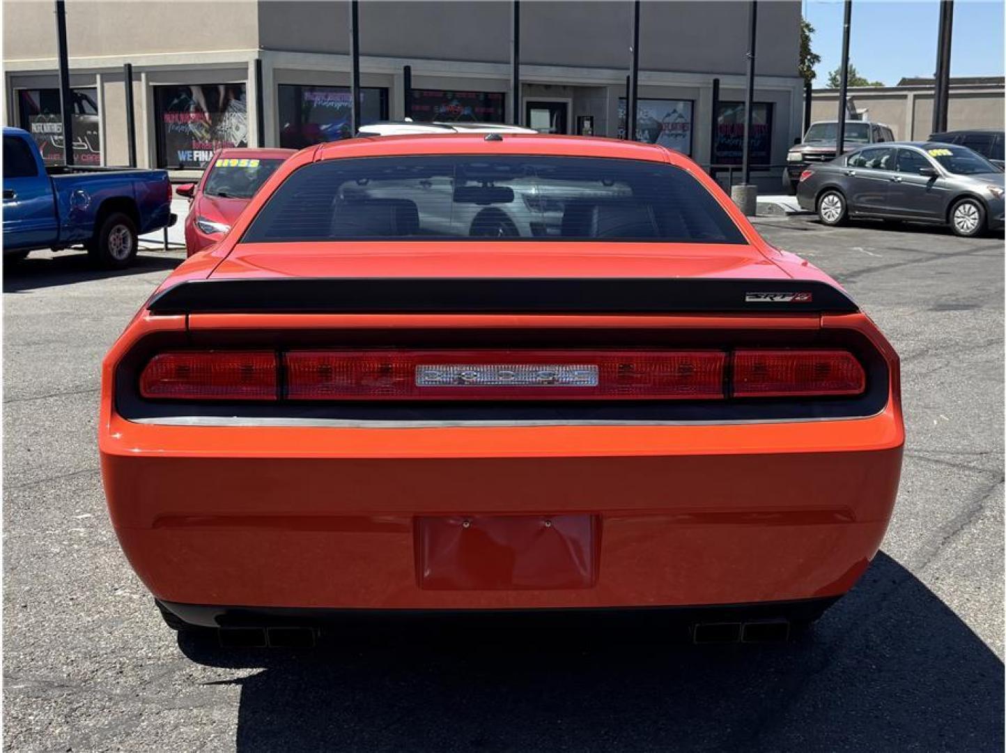 2008 Orange /No Color Dodge Challenger (2B3LJ74W08H) with an V8, HEMI, 6.1 Liter engine, Automatic, 5-Spd transmission, located at 607 W Columbia Drive, Kennewick, WA, 99336, (509) 987-1069, 46.216743, -119.126404 - 2008 Dodge Challenger SRT8 First Edition This 2008 Dodge Challenger SRT8 First Edition is a rare opportunity to own one of the most iconic modern American muscle cars ever produced. Finished in striking Hemi Orange with a black leather interior, this Challenger is First Edition #5874 of only 6,40- Photo#5