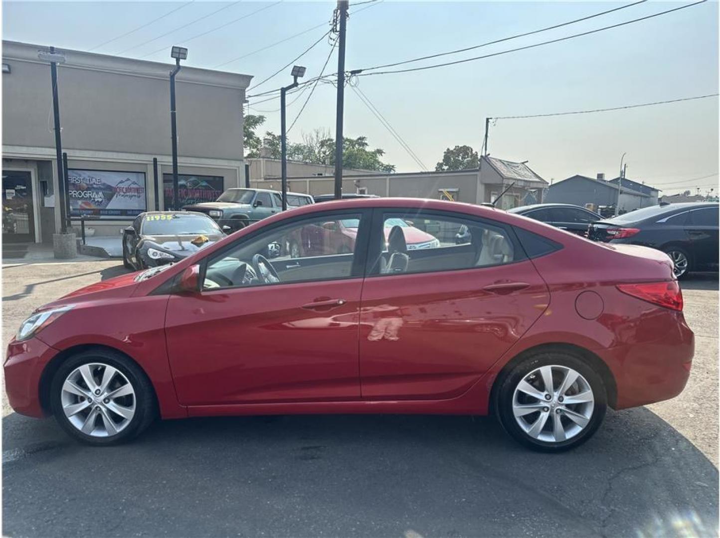 2013 Red /No Color Hyundai Accent (KMHCU4AEXDU) with an 4-Cyl, 1.6 Liter engine, Auto, 6-Spd w/Overdrive transmission, located at 607 W Columbia Drive, Kennewick, WA, 99336, (509) 987-1069, 46.216743, -119.126404- Photo#1