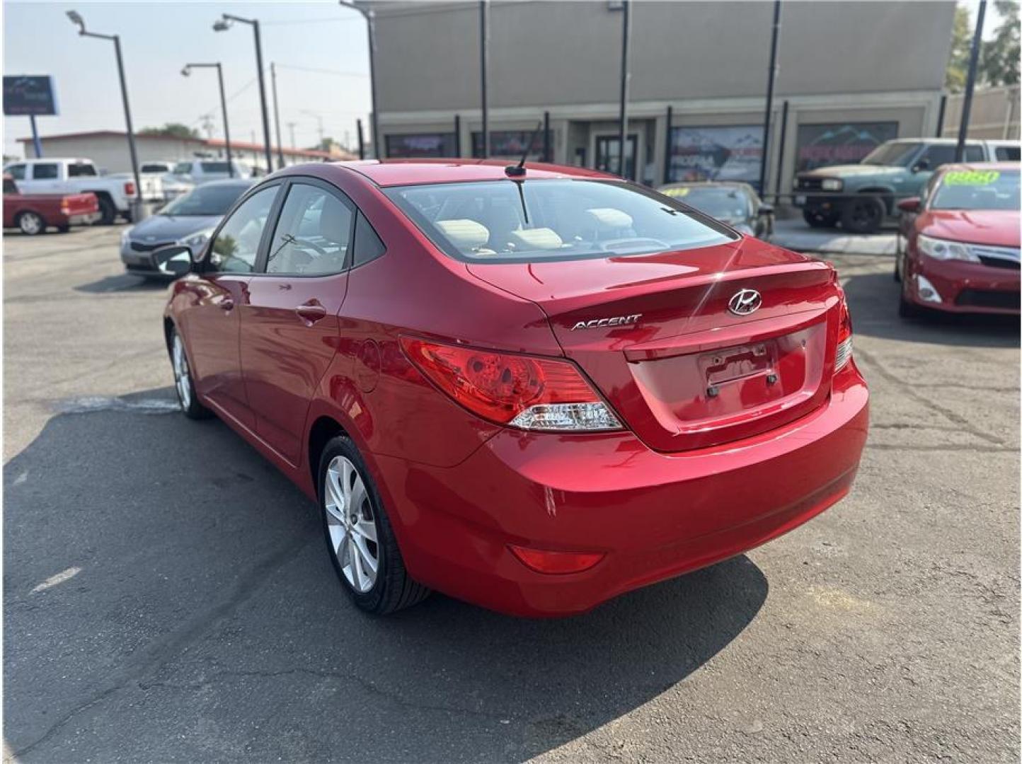 2013 Red /No Color Hyundai Accent (KMHCU4AEXDU) with an 4-Cyl, 1.6 Liter engine, Auto, 6-Spd w/Overdrive transmission, located at 607 W Columbia Drive, Kennewick, WA, 99336, (509) 987-1069, 46.216743, -119.126404- Photo#2