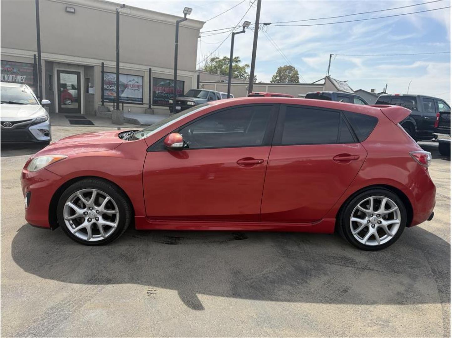2012 Red /No Color MAZDA MAZDA3 (JM1BL1L35C1) with an 4-Cyl, Turbo, 2.3 Liter engine, Manual, 6-Spd transmission, located at 607 W Columbia Drive, Kennewick, WA, 99336, (509) 987-1069, 46.216743, -119.126404- Photo#1