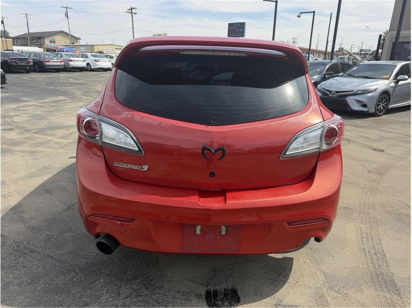 2012 Red /No Color MAZDA MAZDA3 (JM1BL1L35C1) with an 4-Cyl, Turbo, 2.3 Liter engine, Manual, 6-Spd transmission, located at 607 W Columbia Drive, Kennewick, WA, 99336, (509) 987-1069, 46.216743, -119.126404- Photo#3