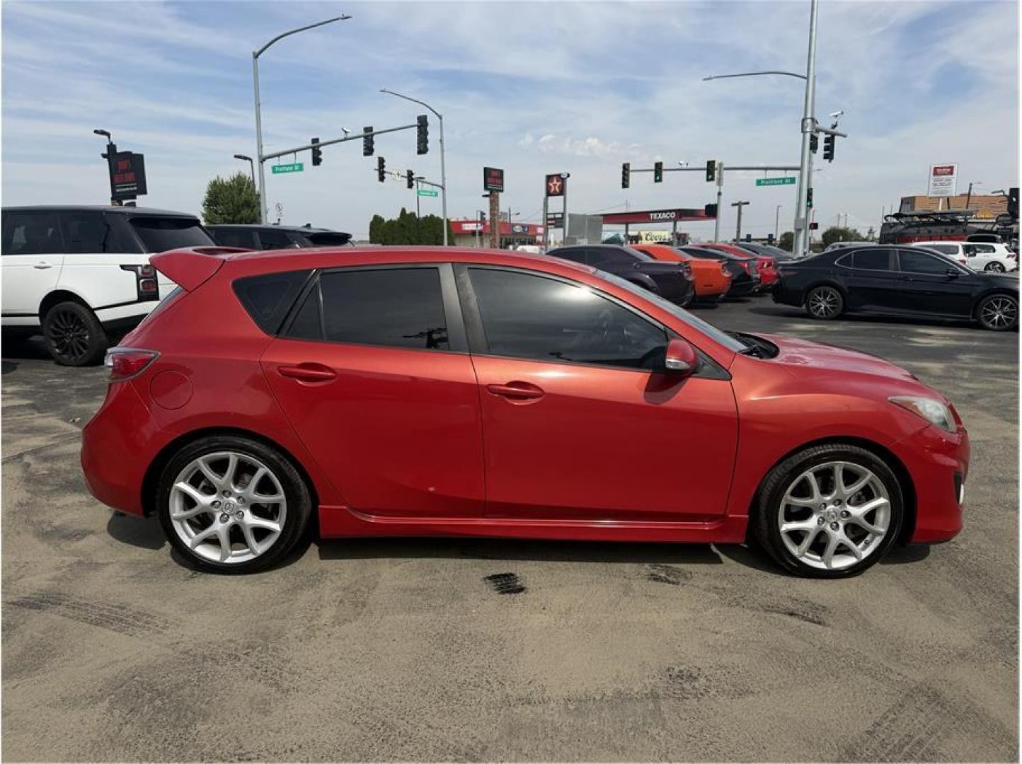 2012 Red /No Color MAZDA MAZDA3 (JM1BL1L35C1) with an 4-Cyl, Turbo, 2.3 Liter engine, Manual, 6-Spd transmission, located at 607 W Columbia Drive, Kennewick, WA, 99336, (509) 987-1069, 46.216743, -119.126404- Photo#6