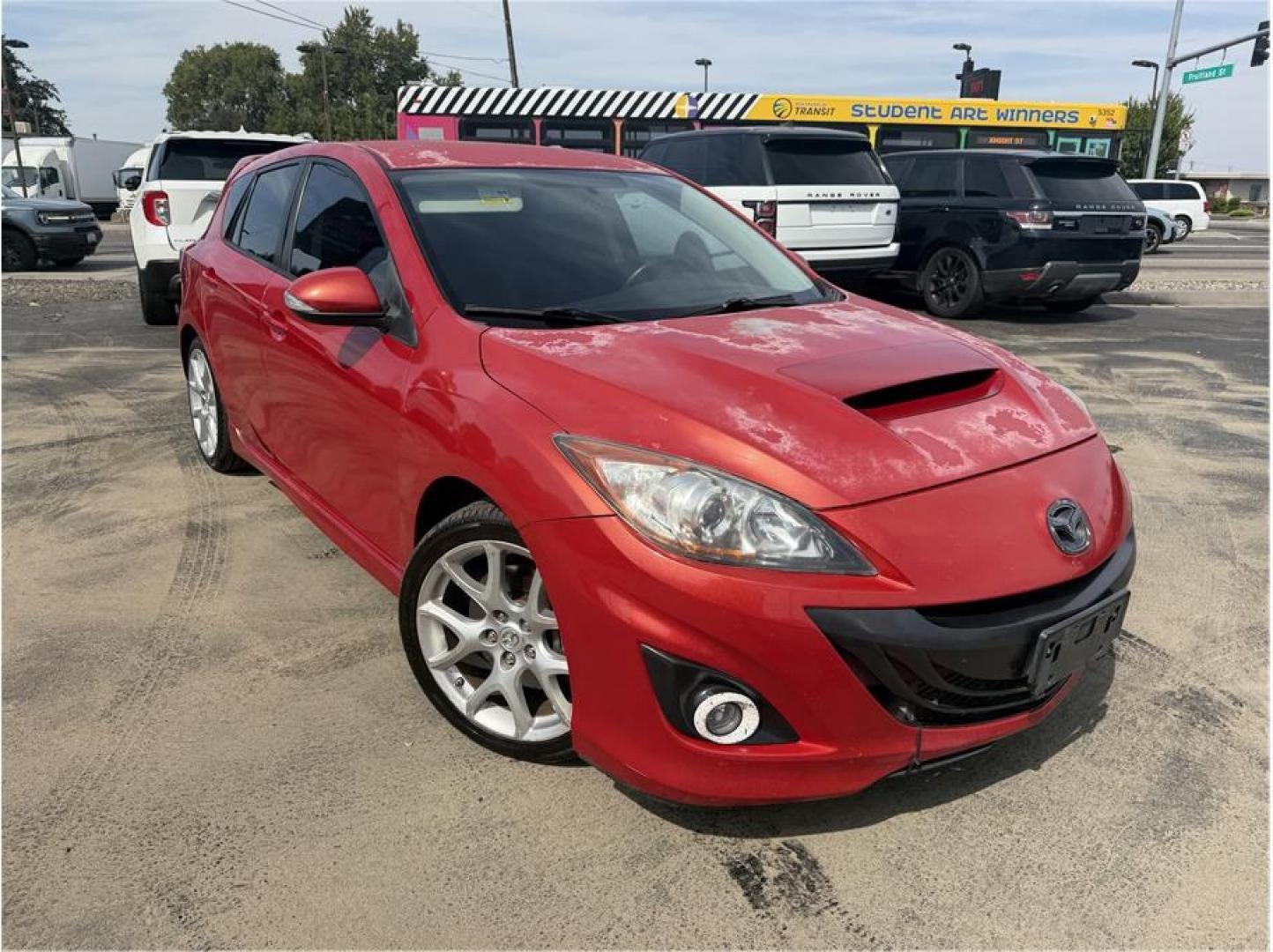 2012 Red /No Color MAZDA MAZDA3 (JM1BL1L35C1) with an 4-Cyl, Turbo, 2.3 Liter engine, Manual, 6-Spd transmission, located at 607 W Columbia Drive, Kennewick, WA, 99336, (509) 987-1069, 46.216743, -119.126404- Photo#7